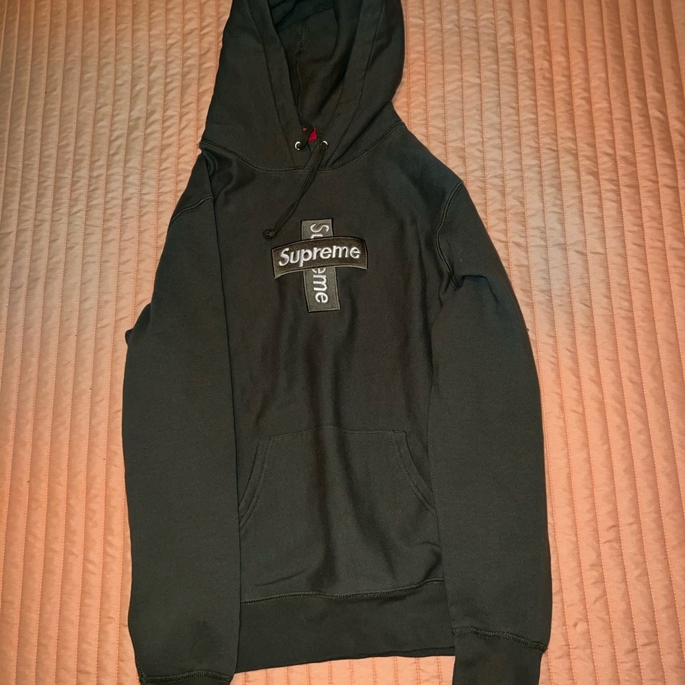 Light green supreme hoodie.